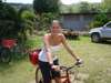 Kate Erskine - riding a bike in the Seychelles